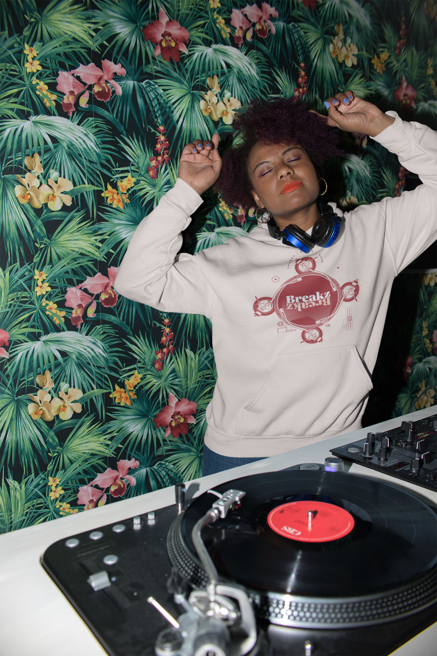 hoodie-mockup-of-a-cool-female-dj-with-an-afro-mixing-some-tracks-23491