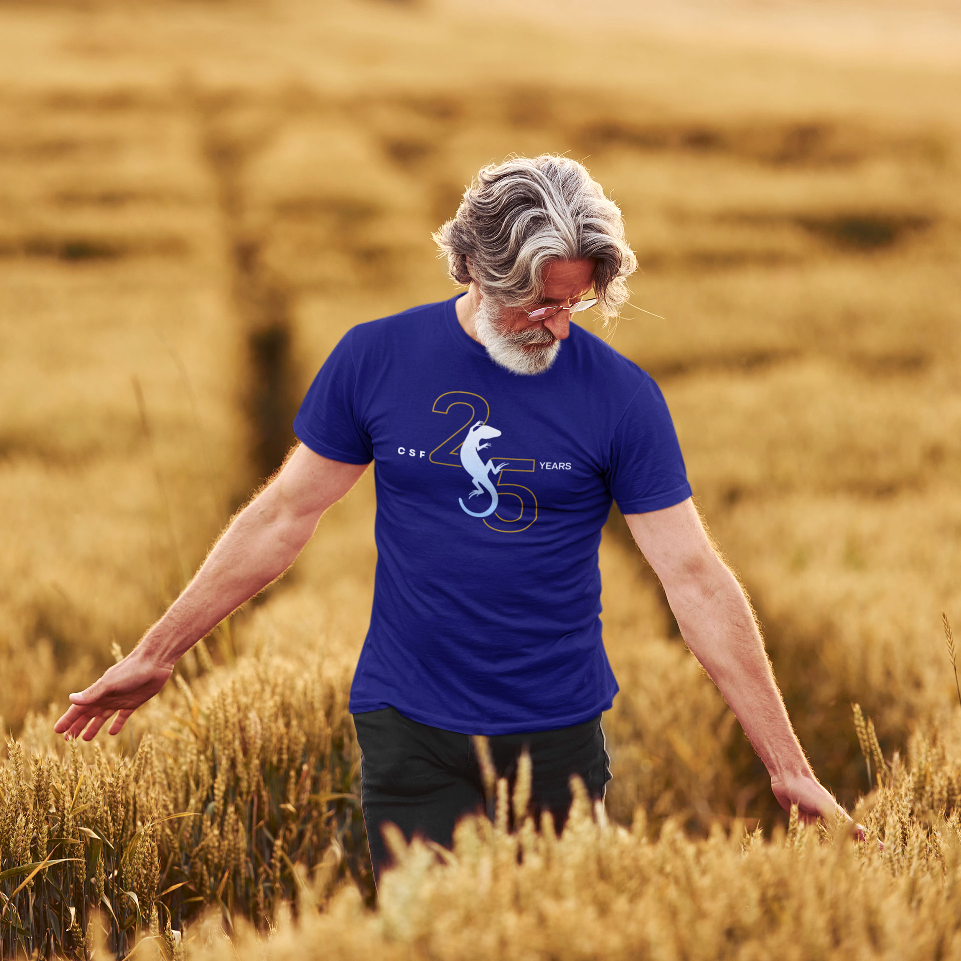 t-shirt-mockup-featuring-a-senior-man-walking-through-a-wheat-field-m24606-r-el2