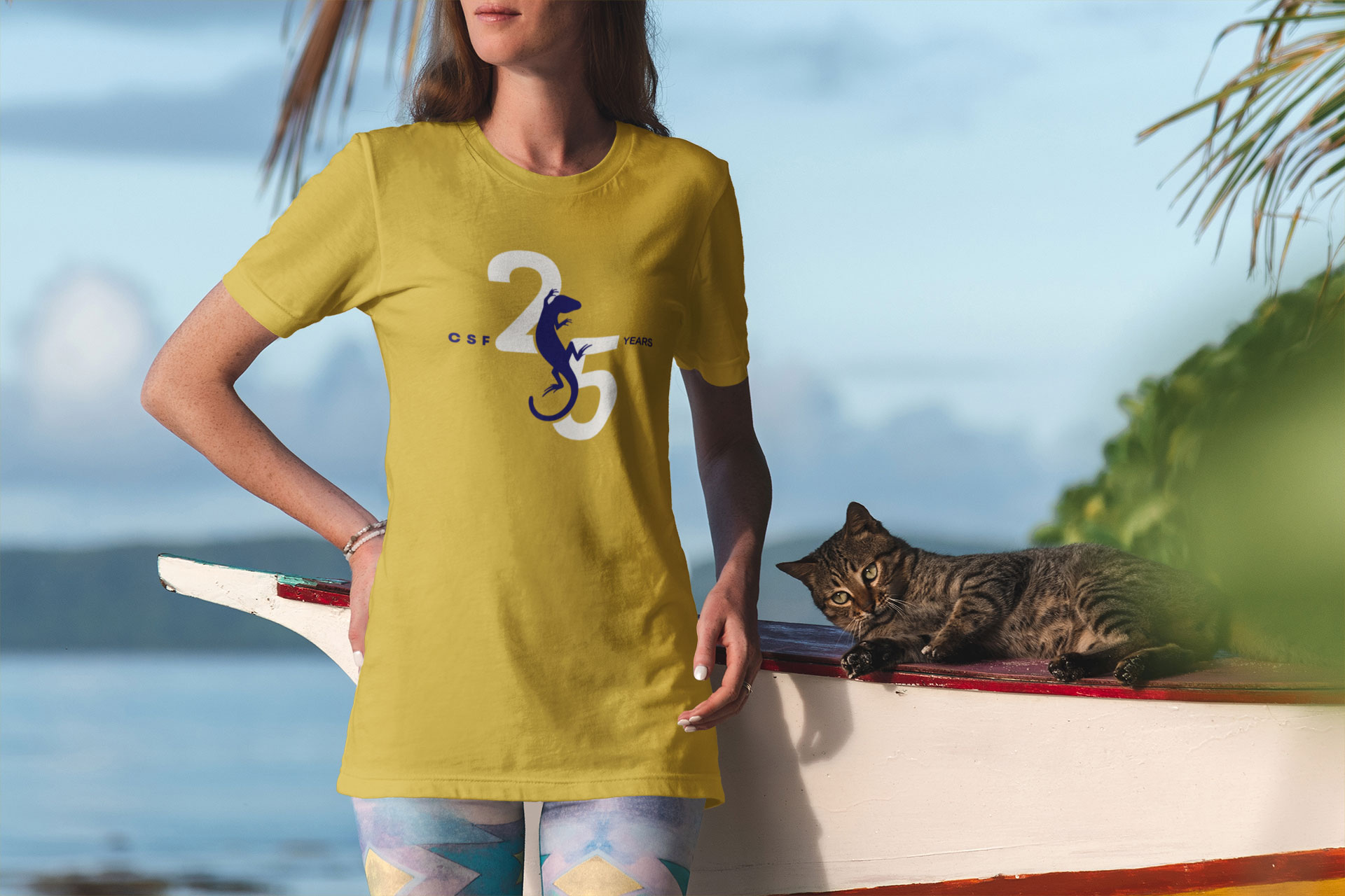 t-shirt-mockup-of-a-woman-standing-by-the-sea-with-a-cat-3310-el1
