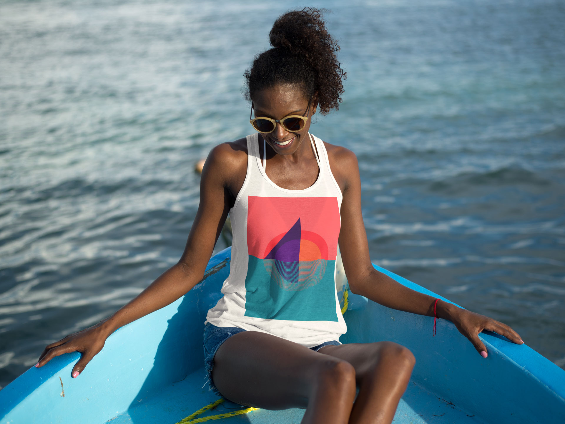 beach-tank-top-mockup-featuring-a-lovely-woman-on-a-boat-in-the-sea-a12743